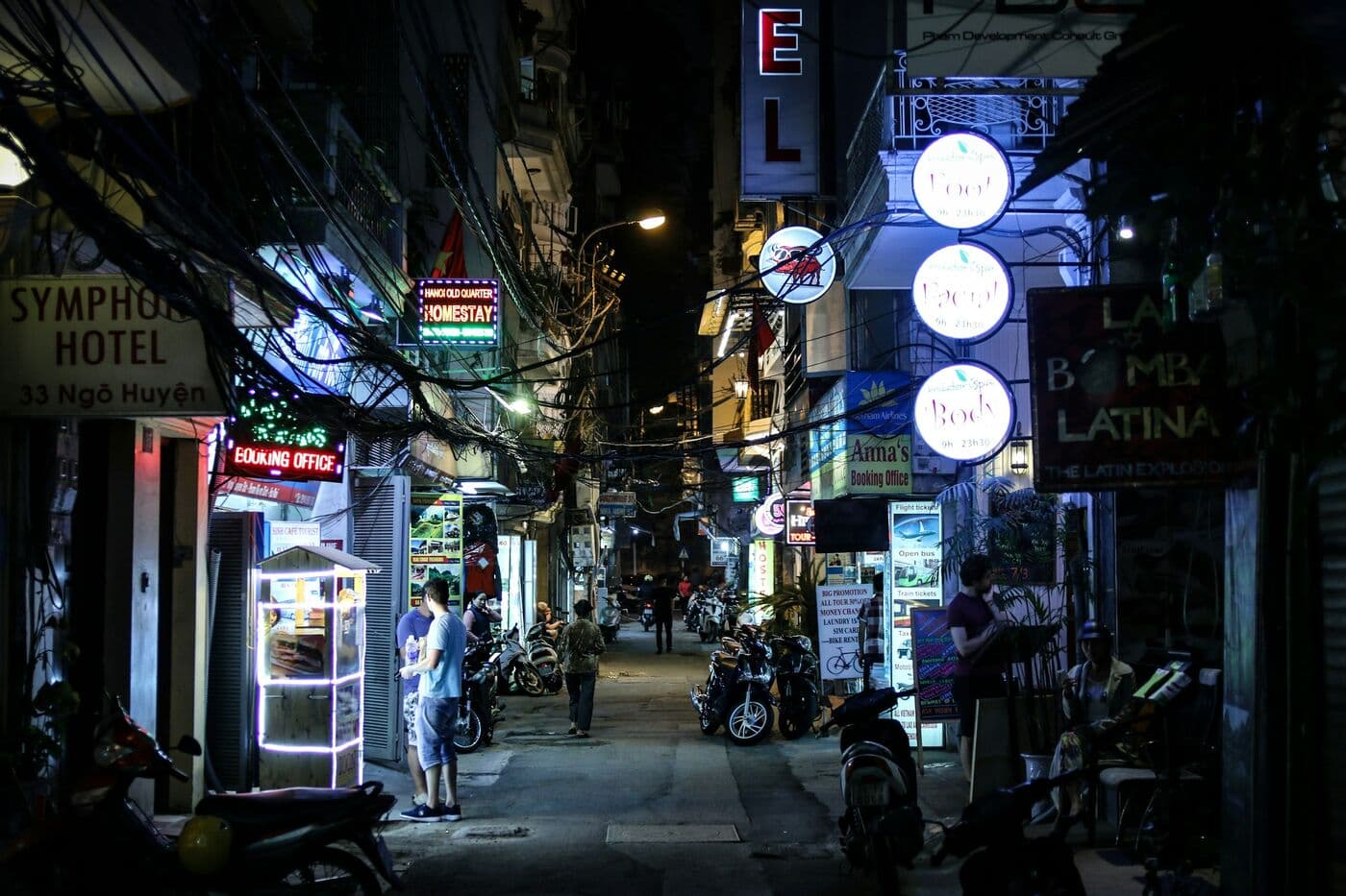 A Hanoi street lit up at night