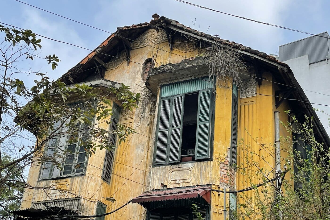 Yellow French-era house in Hanoi