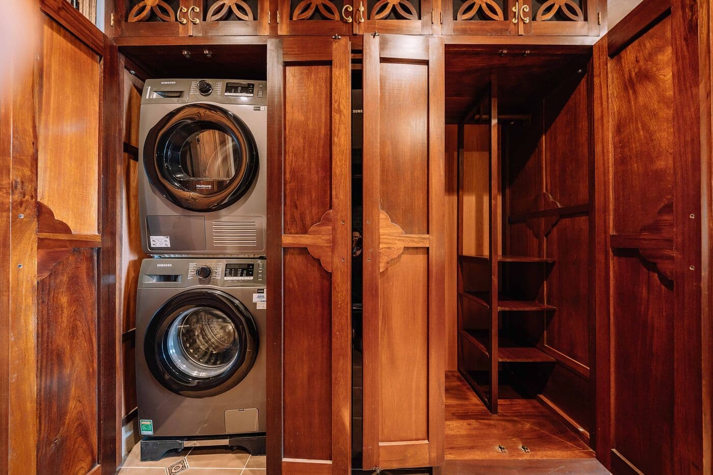 Washer-dryer inside a wooden wardrobe